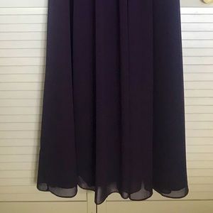 Beautiful purple evening gown .